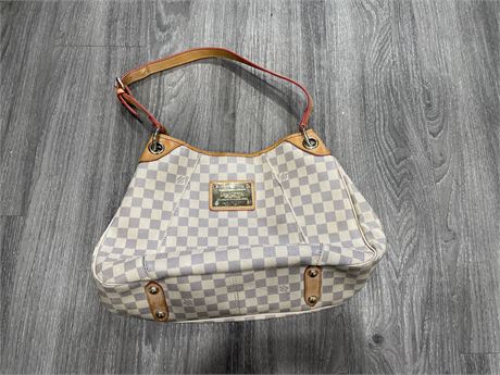 LOUIS VUITTON PUSE (UNAUTHENTICATED) (16”)