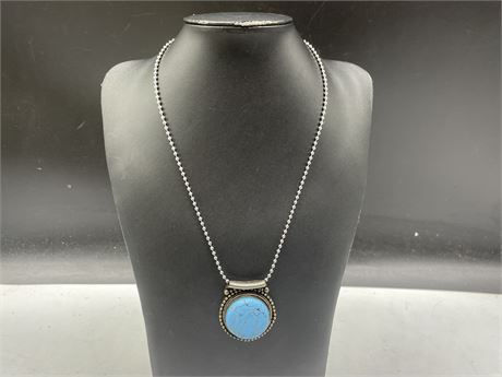 TURQUOISE SET IN SILVER PENDANT (CHAIN NOT SILVER)