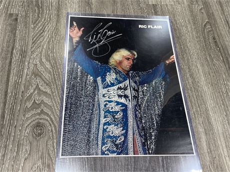SIGNED RIC FLAIR PICTURE (11”x15”)