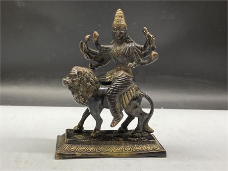 EARLY HEAVY BRASS EASTERN GODESS ON LION (7”x3”x9”)