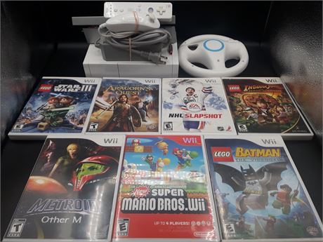 EXCELLENT CONDITION - NINTENDO WII WITH 7 GAMES AND STEERING WHEEL