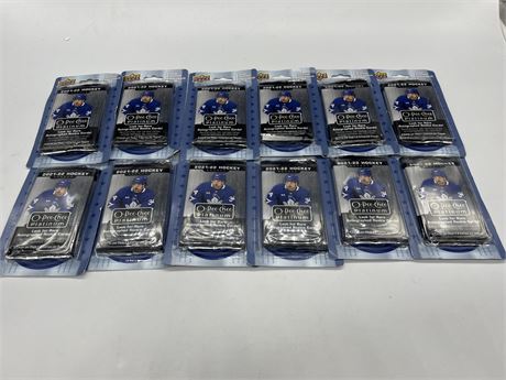 12 PACKAGES OF 2021-22 O-PEE-CHEE PLATINUM HOCKEY CARDS (2 PACKS PER PACKAGE)