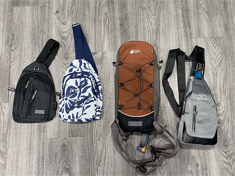 4 SLINGS/POUCHES - SOME NEW