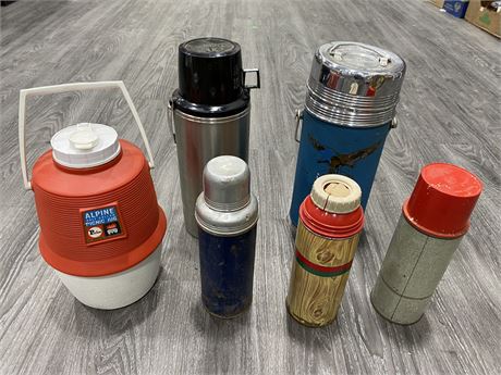 6 VINTAGE THERMOS’ (Largest is 12” tall)