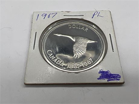 1967 CENTENNIAL “FLYING GOOSE” DOLLAR (.800 SILVER)