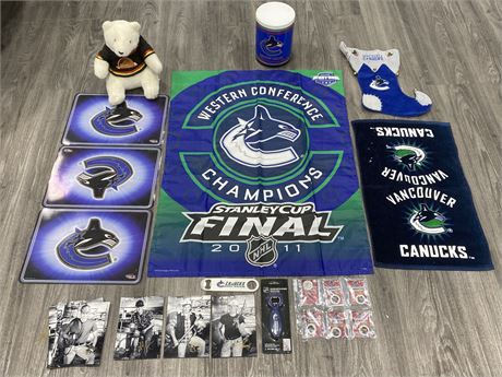 CANUCKS COLLECTIBLES (BANNER IS 28”X37”)