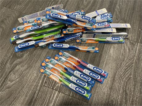 28 NEW ORAL B TOOTHBRUSHES
