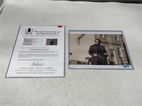 CLINT EASTWOOD SIGNED PALE RIDER 8"X10" PHOTO - BECKETT AUTHETIC W/ FULL LOA