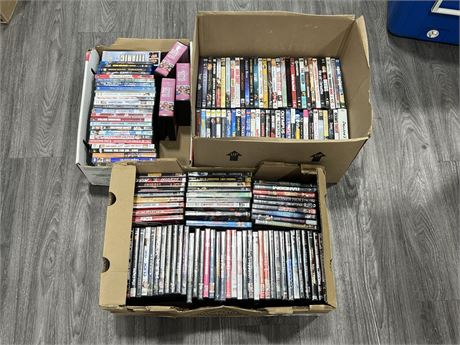 3 BOXES OF DVDS
