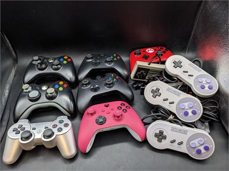 LARGE COLLECTION OF CONTROLLERS NEEDING VARIOUS REPAIRS - AS IS