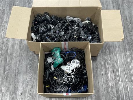 (AS-IS) 2 BOXES OF PS1 / PS2 CONTROLLERS