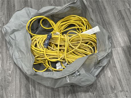 TWO YELLOW EXTENSION CORDS IN BAG 200FT LONG