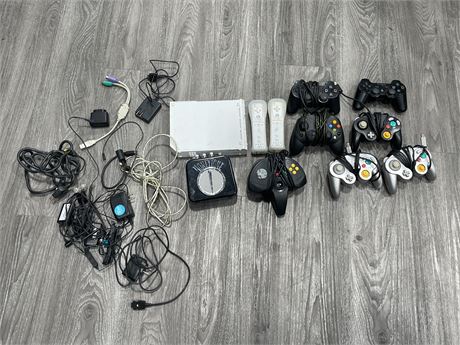 LOT OF MISC GAMING CONTROLLERS, CORDS & WII CONSOLE (UNTESTED)