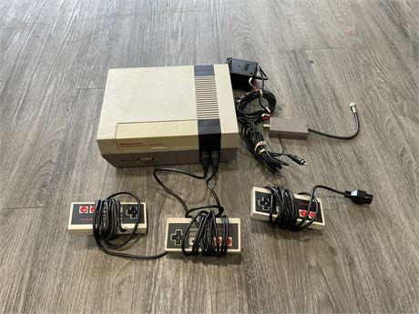 NES SYSTEM WITH 3 CONTROLLERS & CORDS (UNTESTED) (AS IS)
