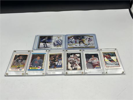 8 MISC NHL CARDS IN HARD CASES