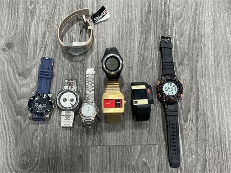 8 MENS WATCHES - ONE STILL NEW W/ TAGS
