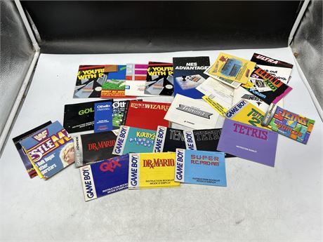 LOT OF VIDEO GAME MANUALS & FOLDED UP POSTERS