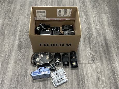 LOT OF ASSORTED CAMERA BODIES & LENSES