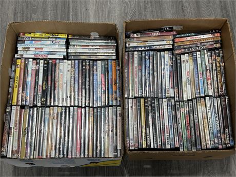 2 BOXES OF DVDS