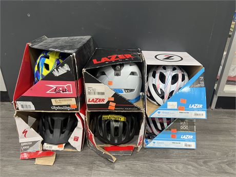 LOT OF 6 NEW ASSORTED BIKE HELMETS - SIZES SMALL - 2XL