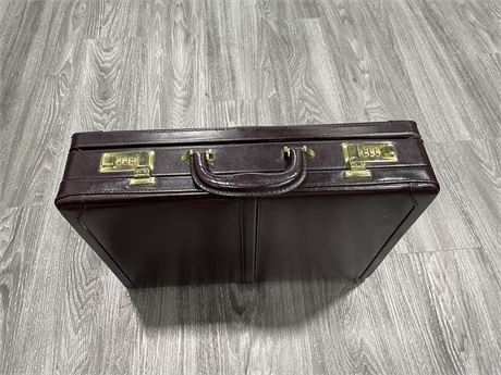 LIKE NEW SUIT CASE W/ INSTRUCTIONS TO SET CODE