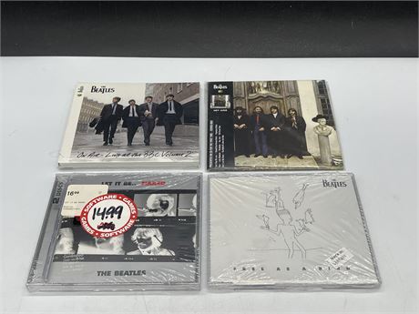 4 SEALED THE BEATLES CDS - MOSLTY OLD STOCK