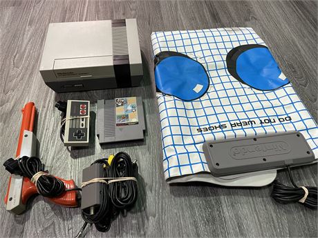 NINTENDO SYSTEM WITH CONTROLLER/TRACK PAD/DUCK HUNT GUN/CORDS