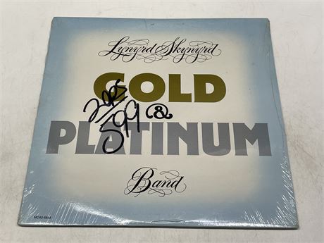 SEALED OLD STOCK - LYNARD SKYNYRD BAND - GOLD AND PLATINUM