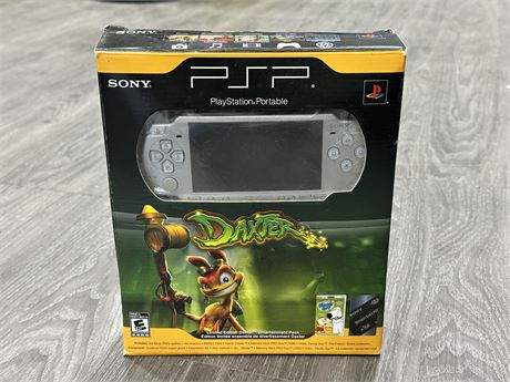 LIKE NEW PSP DAXTER IN OPEN BOX W/ACCESSORIES