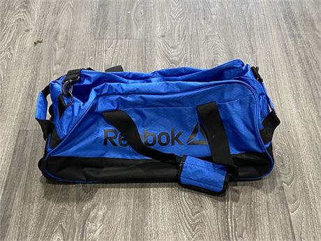 BLUE REEBOK TRAVEL/DUFFLE BAG ON WHEELS
