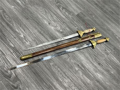 2 DECORATIVE STAINLESS STEEL SWORDS (Longest is 38”)