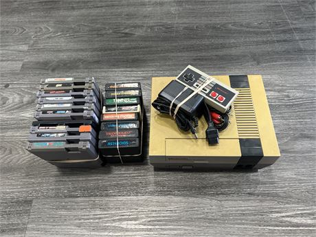 NES SYSTEM W/ CORDS & CONTROLLER + 10 NES GAMES & 8 ATARI GAMES