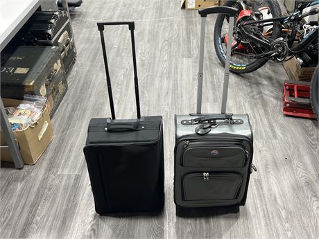 2 CARRY ON SUITCASES