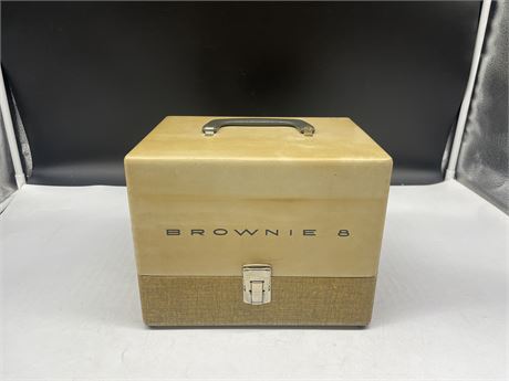 VINTAGE BROWNIE 8 MOVIE PROJECTOR IN ORIGINAL CASE; RUNS AND LIGHTS UP (AS-IS)
