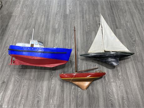 3 LARGE HAND MADE WOODEN BOATS (Far right 44’ tall)