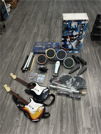 ROCK BAND 2/3 DRUMSETS / 2 GUITAIRS W/ ORIGINAL BOXES + BOTH GAMES