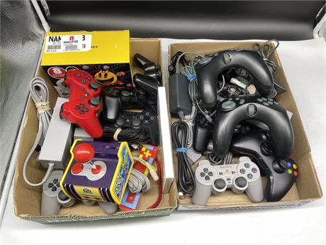 2 TRAYS OF VIDEO GAME ACCESSORIES