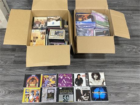 2 BOXES OF MISC. CD’S