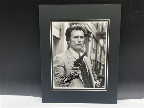 CLINT EASTWOOD SIGNED “DIRTY HARRY” PHOTO W/COA - DOUBLE MATTED 11”x14”