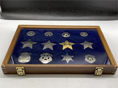 RARE COLLECTION OF OLD WEST BADGES IN DISPLAY CASE (12”x18”x2”)