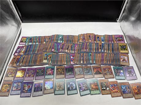 YU-GI-OH CARD COLLECTION INCLUDING THE BLACK STONE OF LEGEND, LAVA GOLEM, ETC