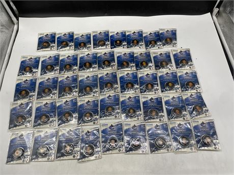 (44) 2006-07 VANCOUVER CANUCKS MINI PUCK COLLECTION