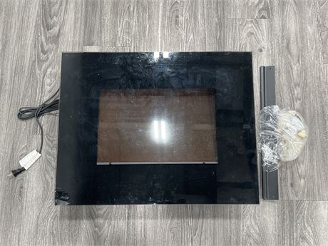 LIKE NEW ELECTRONIC FIRE PLACE W/ HARDWARE - SOME SCRATCHES IN GLASS - 26”x20”