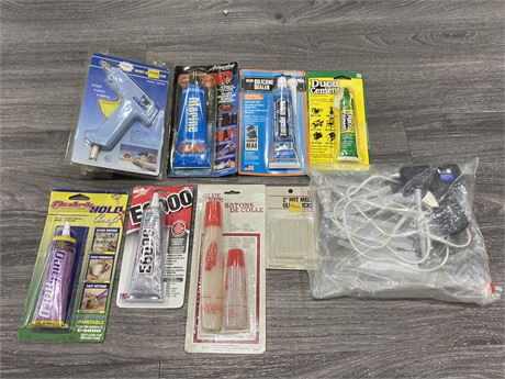 LOT OF GLUE GUNS + MISC. ADHESIVE PRODUCTS