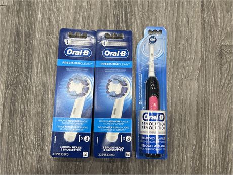 NEW ORAL-B ELECTRIC TOOTH BRUSH W/ 6 NEW REPLACEMENT HEADS