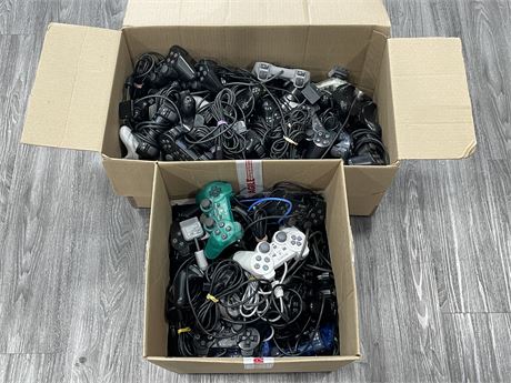 (AS-IS)  2 BOXES OF PS1 / PS2 CONTROLLERS (MOST ARE DEFECTIVE)