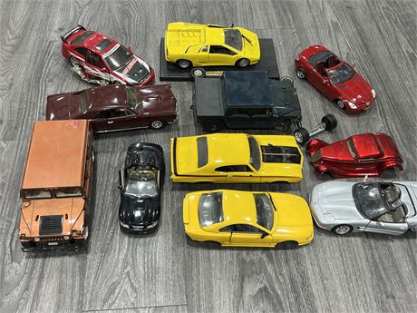 11 LARGE SCALE DIECAST CARS - AS IS / MOST HAVE DAMAGE OR MISSING PARTS