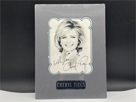 CHERYL TIEGS MATTED AUTOGRAPHED PHOTO W/COA (12”X16”)