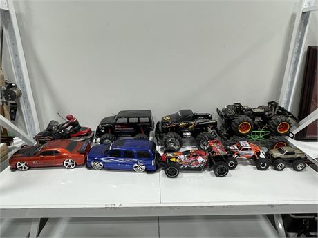 RC CAR / MONSTER TRUCKS / OTHERS (NO REMOTES - AS IS - LARGEST IS ~16”