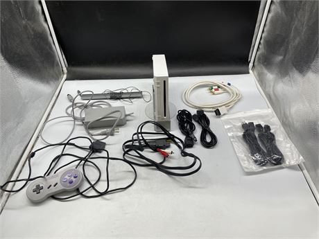 WII CONSOLE WITH MISC CORDS & SNES CONTROLLER